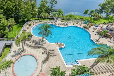 an overhead view of a swimming pool at a resort at Blue Heron Beach Resort pet friendly in Orlando