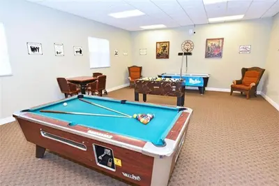 a billiard room with a pool table in it at Quiet Disney Condo w/ Balcony ~ 2 Miles to Disney World! in Orlando