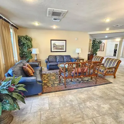 a living room with a couch and a table at 3608 Orlando Vacational 1st floor in Orlando