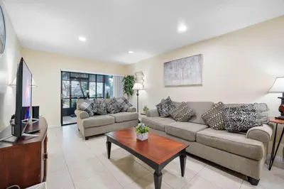 a living room with two couches and a tv at 3608 Orlando Vacational 1st floor in Orlando