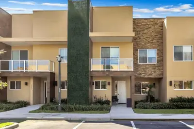 a large apartment building with a large pole at wish home disney (45437492) in Orlando