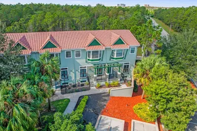 an overhead view of a large house with trees at Sunny Summer in FL - Relax in a TownHome by Disney! in Orlando