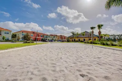 a basketball court in the middle of a street with houses at 8953 Candy Palm Road in Kissimmee