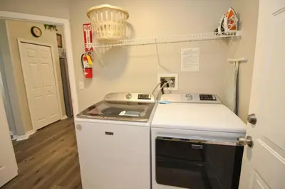 a kitchen with a stove and a sink at Newly Renovated Home With Calming Atmosphere in Kissimmee