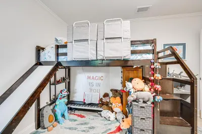 a bunk bed with many stuffed animals in a room at 10 Mi to Disney World Lakeside Orlando Getaway! in Orlando