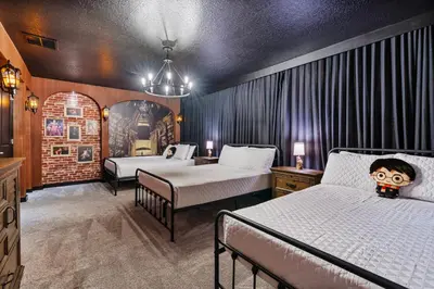 a hotel room with two beds at New Home 9 Bedrooms and 5 Bathrooms At Storey Lake in Kissimmee