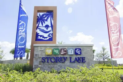 a sign for a store with flags in front of it at Amazing home at Storey lake 2 minutes to clubhouse in Kissimmee