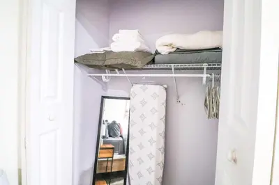 a room with a bunk bed and a mirror at NEW Designed Apt 2023 NrUCF PETSOk PrivateEntry in Orlando