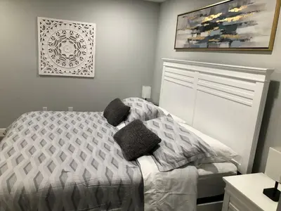 a bedroom with a bed with two pillows on it at Cozy apartment near Disney with 3 bedrooms 58 in Kissimmee