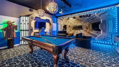 a billiard room with a pool table in the middle at The Skywalker in Orlando