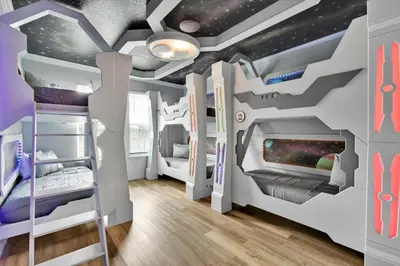 a childrens room with a star system mural at Villa Grande in Orlando