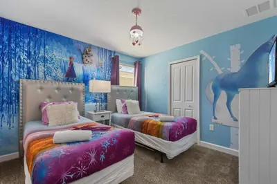 a bedroom with two beds and a horse mural at Lake View Cozy Home w/ Pool & Games Near Disney in Kissimmee