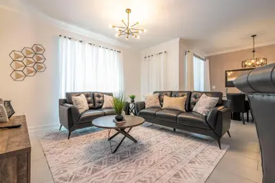 a living room with two couches and a table at Fantastic Mickey house Waterpark near Disney 2572 in Kissimmee