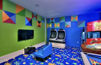 a childs room with a play room with a play room at All Vacation Mansion w Spa-Pool-Cinema Sleep 40 in Kissimmee