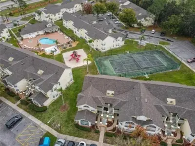 an aerial view of a house with a tennis court at Disney Themed Condo in Kissimmee