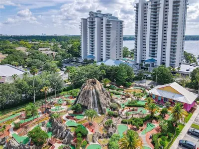 an aerial view of a resort with a theme park at Sunshine Oasis - Orlando Lakefront Luxury in Orlando