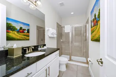 a bathroom with a sink and a shower at Spacious Home With Private Pool Near Disney With Waterpark & Resort Access At Encore Resort - 7720Ff in Kissimmee