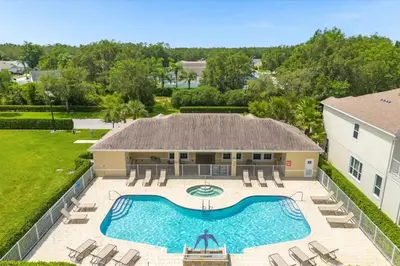 an aerial view of a house with a swimming pool at Disney Retreat Lakeview townhome - close to golf in Orlando