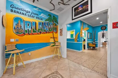a room with a large sign on the wall at Banana Leaf Villa-Island groove-Standard room in Orlando