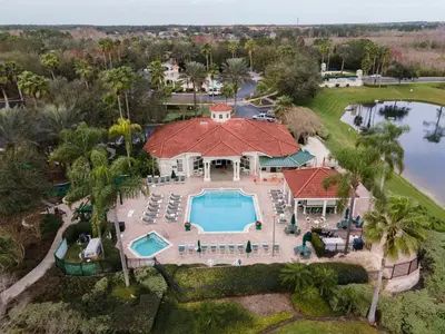 an aerial view of a house with a swimming pool at Natural Reserve Home at Emerald Islands in Kissimmee