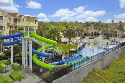an image of a water park at a resort at 3 miles to Disney, water park, kids disney rooms, pool table, air hockey, private pool and spa in Orlando