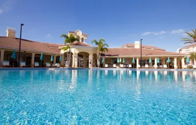 a large swimming pool in front of a hotel at Vista Cay Luxury Rhapsody condo in Orlando