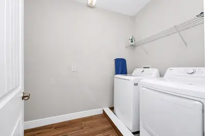a laundry room with a washer and dryer at Marvelous Home With Private Pool And Waterpark Access Near Disney At Encore Resorts Reunion - 131La in Kissimmee