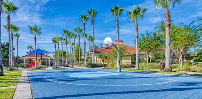 a basketball court at a resort with palm trees at 201 HB - Hideaway at TerraVerde in Kissimmee