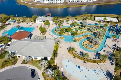 an aerial view of a water park at 4 Bedroom 3 Bathroom Storey Lake 4895CT in Kissimmee