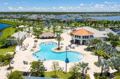 an aerial view of the pool at the resort at 4 Bedroom 3 Bathroom Storey Lake 4895CT in Kissimmee