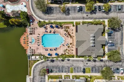 an aerial view of a resort with a swimming pool at 4 Bedroom 3 Bathroom Villas At Seven Dwarfs 24-102 in Kissimmee