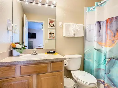 a bathroom with a sink and a toilet and a shower at WH7742CS - Newly renovated villa in Windsor Hills in Orlando