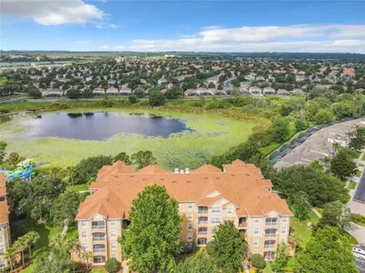 an aerial view of an apartment complex with a lake at WH7660-205CS - Lakeview on the hills in Orlando