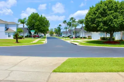 a street in a residential neighborhood with houses at 637- Huge 5 Bed Villa with Amazing Water Views and Own Private Pool and Spa in Kissimmee