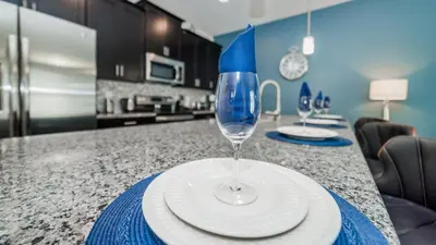 a wine glass sitting on top of a kitchen counter at Sea Haven in Orlando