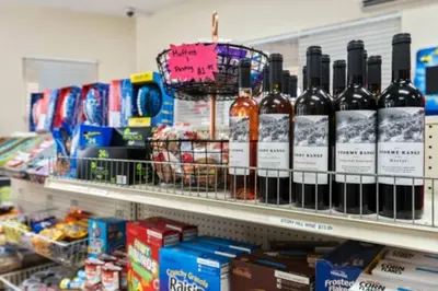 a bunch of bottles of wine on a store shelf at Windsor Hills Magic,Resort Waterslides,Pool,Disney in Orlando