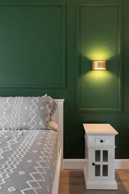 a green bedroom with a bed and a night stand at New Listing Just remodeled 4 BR - ER2739 in Kissimmee