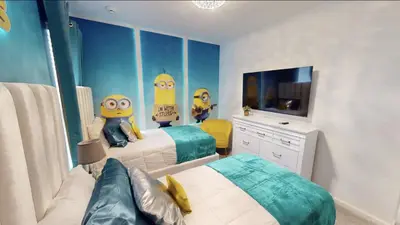 a bedroom with two beds and a tv in it at Paradiso Grande 8BD Games Themed Rooms & Pool Spa in Orlando
