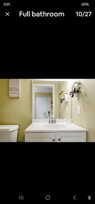 a bathroom with a sink and a toilet at Pretige Studio in Orlando