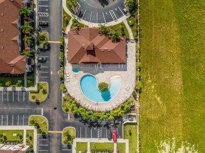 an overhead view of a house with a swimming pool at Tropical Getaway with Xbox & PS5 Gaming Paradise in Kissimmee
