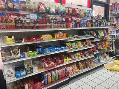 a grocery store aisle filled with lots of food at DisneyShuttleKing & Queen Be 5 minutes to Disney in Orlando
