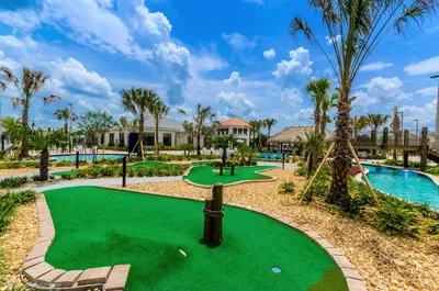 a golf course at the resort with a putting green at 3191 Paradox Circle 202 in Kissimmee