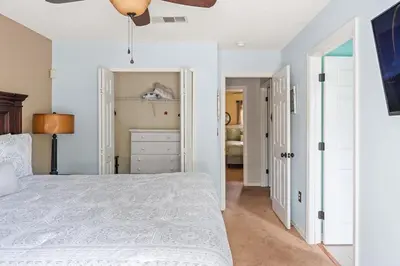 a bedroom with a bed and a ceiling fan at Harry Potter Themed 3 BR - ER2782 in Kissimmee