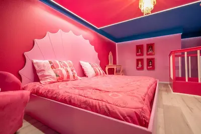 a pink bedroom with a bed with a pink ceiling at Sea World neighbor Deluxe Home Up to 33 ppl 5800 in Orlando