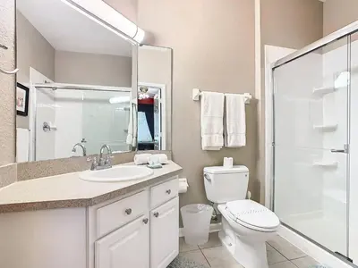 a bathroom with a toilet and a sink and a shower at C2784-102 Themed Room Free Resort Water Park 3 miles to Disney in Orlando