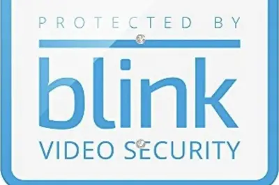 a white sign with the text protected byilla video security at Sleeps8- WorldCup2026- NearDisney- Universal in Kissimmee