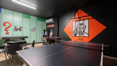 a ping pong room with a ping pong table at Upstay Family Home w Pool, Cinema & Games Room in Kissimmee
