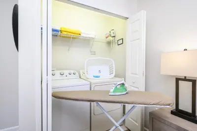 a laundry room with a washer and dryer at Epic Universe New Listing, Family Vacation Townhome - 4011 in Orlando