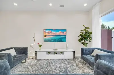 a living room with two couches and a coffee table at 5 BD 5BA Themed House Near Disney in Orlando