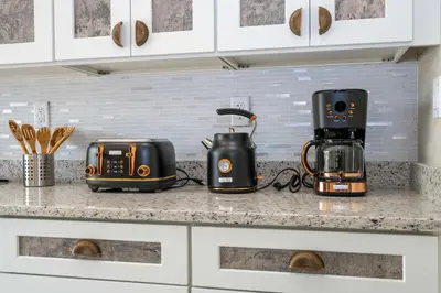 a kitchen counter with two toasters and a toaster at A Galaxy’s Edge Experience Awaits 5 Min to Disney in Orlando